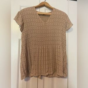 Women’s cheetah print short sleeve high low top